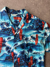 Load image into Gallery viewer, 1970s Hawaii shirt Hookano lucky coins tiki blue. Made in Hawaii
